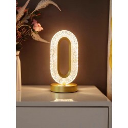 Une lampe de table LED merveilleusement conçue avec trois niveaux de couleurs pour l'éclairage nocturne de la chambre. Un design