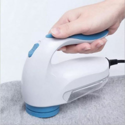 Fabric lint electric razor